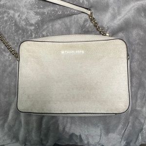 Cream colored Michael kors crossbody.